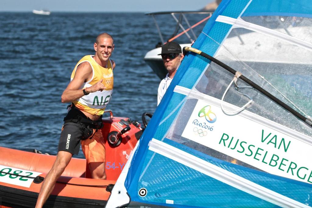 Day 7 - RS:X Mens August 14, 2016. Medal race Aaron Macintosh (NZL) coach of the  double Olympic Gold medalist Dorian van Rjsselberghe  (NED) © Richard Gladwell www.photosport.co.nz